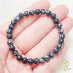 Load image into Gallery viewer, Snowflake Obsidian Bracelet
